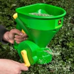 how to use a handheld seed spreader