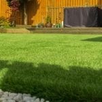 how to level a sloping lawn image