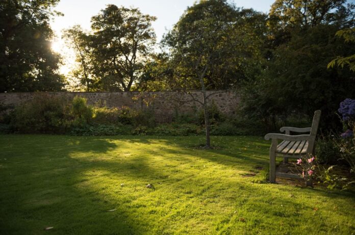 how to level a sloping lawn