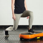 fitness-expert-lunges-on-a-mirafit-vibration-plate-1024×683