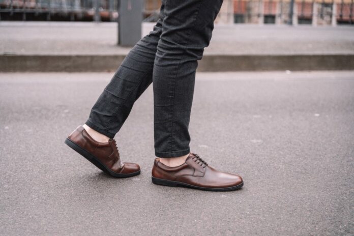 businessman with barefeet shoes