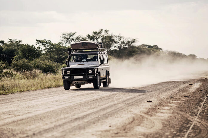 Your Driving Conditions - dusty road driving requires frequent car washes