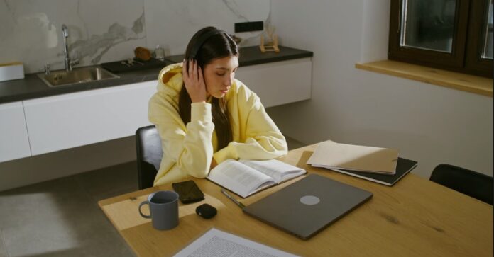 girl studying and listen music