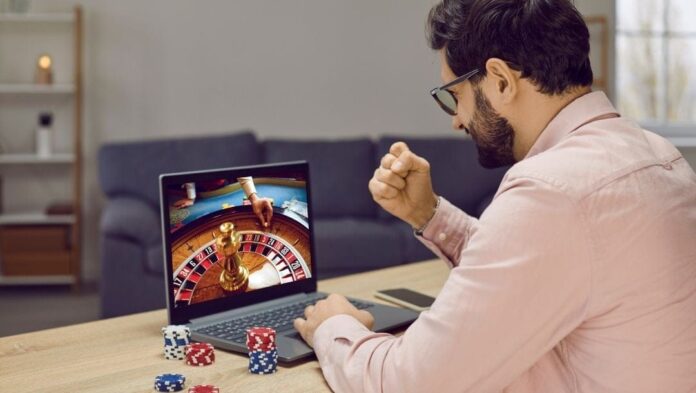 A Man Watching Live Casino Games
